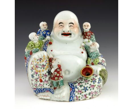 A Chinese ceramic figure of Hotei, 20th century, seated smiling surrounded by five infants, polychrome and gilt decoration, i