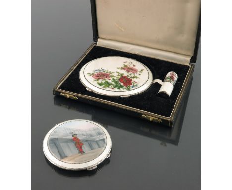 An Elizabeth II silver powder compact with enamelled Beefeater to the cover, Henry Clifford Davis, Birmingham 1952, together 