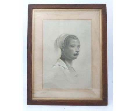 African American interest, a fine portrait drawing of a young man, signed Y. Ravern and dated 1892, 66.5cm by 53cm, framed