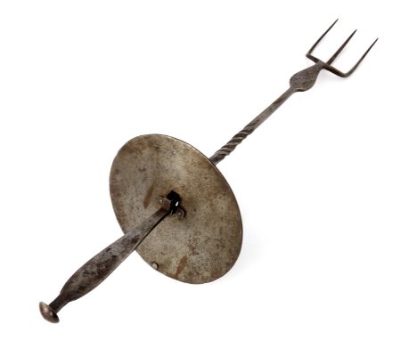 Ernest Gimson (attributed), an Arts and Crafts Cotswold School wrought steel toasting fork, with circular counterweighted han