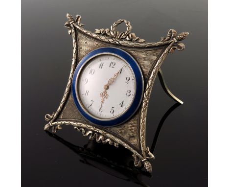 A Russian silver engine turned easel travel timepiece, late 19th Century, white enamel dial with Arabic numerals, blue enamel