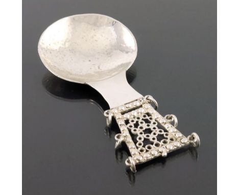 A large Arts and Crafts silver caddy spoon, Sandheim Brothers, London 1922, circular planished bowl on a triangular handle, r