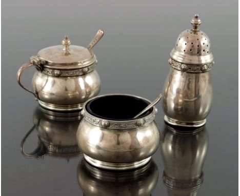 A George VI Iona style three piece silver cruet, Goldsmiths and Silversmiths Company, Birmingham 1951, including salt cellar,