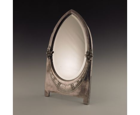 WMF, a Jugendstil silver plated easel back mirror, the bevelled teardrop glass within a bracket footed pointed arch frame, em