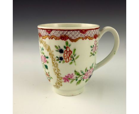 A Worcester polychrome coffee cup, circa 1770, painted with Chinese flowers within a seaweed wreath, in the famille rose styl