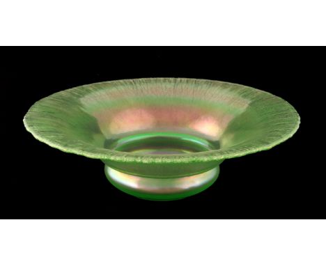 WMF, a Myra iridescent glass bowl, circa 1915, flared, on squat ovoid base, uranium green lustre with crackled rim, in the st