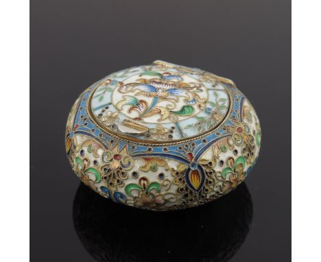 A Russian silver cloisonne enamel snuff box, of circular form, the hinged cover with a floral design on a cream and blue grou