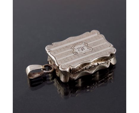 A Victorian silver vinaigrette, David Pettifer, Birmingham 1851, castle top form ogee rim with engine turned stripe design, p