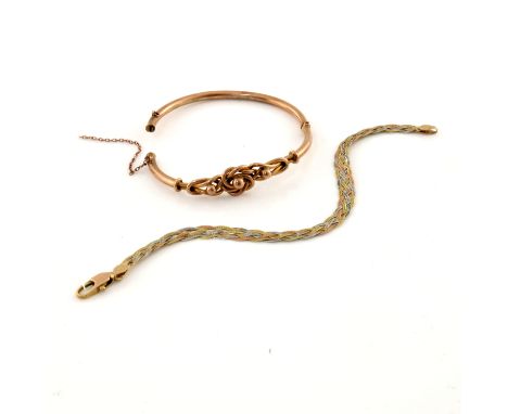 A 9ct gold hinged bangle and a 9ct gold tri-colour bracelet, clasp to bangle is deficient, one stamped 9ct, one with import m