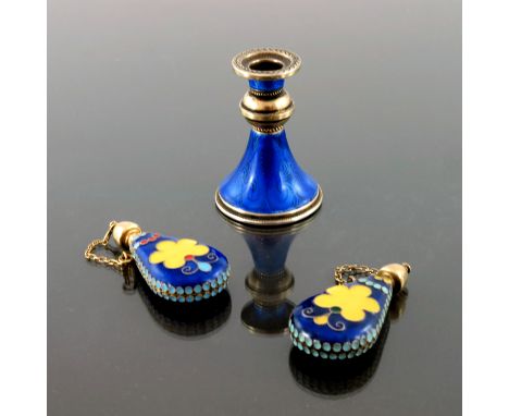 A Continental silver gilt and blue enamel miniature candlestick, French import marks, splayed conical trumpet form with bande