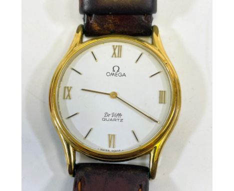 An Omega De Ville quartz wristwatch.&nbsp; With a 33mm diameter case, lug width 18mm, on a leather strap with an Omega fabric