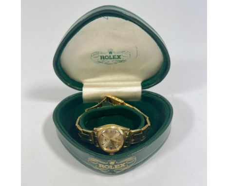 A ladies 18ct yellow gold Rolex Oyster perpetual bracelet wristwatch. 24mm case. Model 6509 Serial number 448433. Total weigh