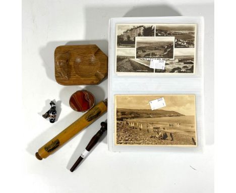 A collection of bygones and collectables to include a Robert Mouseman carved oak ashtray, a mauchlineware ruler, an agate mou