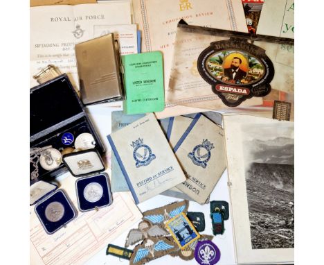 A collection of militaria including Paratroopers to George Ian Dawson including photographs, two tournament medallions and a 