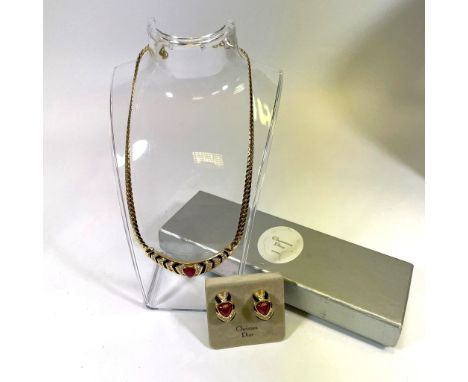 A set of Christian Dior costume jewellery comprising a gold tone enamel faux ruby and white stone collar necklace signed and 