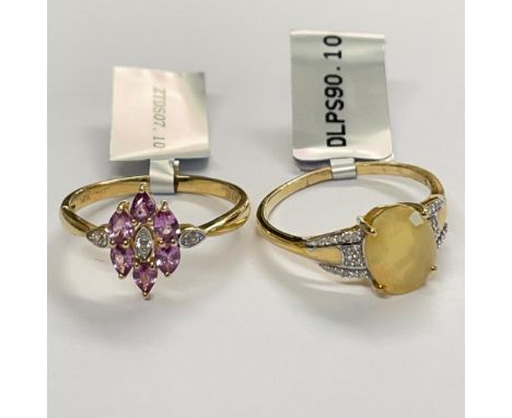 Two 9ct gold gem set dress rings: a 9ct yellow gold Ethiopian opal & diamond ring and a 9ct yellow gold purple sapphire & whi