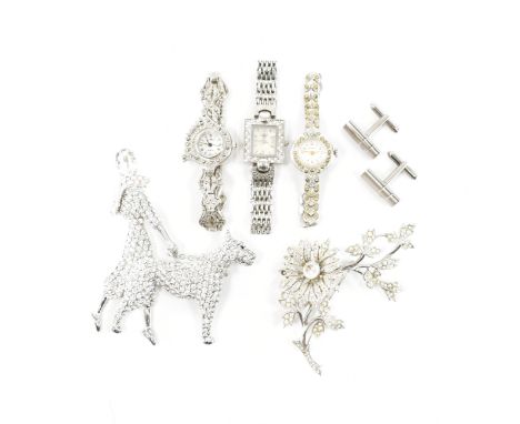 A collection of vintage costume jewellery. The lot to include; a Butler &amp; Wilson crystal set brooch depicting a lady dog 