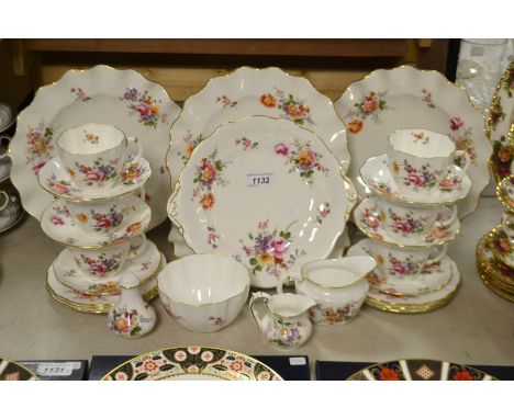 A Royal Crown Derby Posie six piece tea service with four wavy edge plates, bread and butter plate, milk, sugar; etc