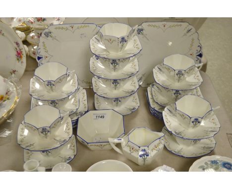 A Shelley Queen Anne shaped Blue Iris tea service for twelve, pattern no 11561