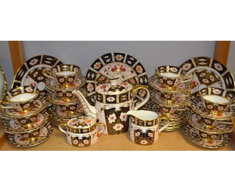 A Royal Crown Derby 2451 pattern tea service for twelve including tea pot, milk, sugar, three bread and butter plates, side p