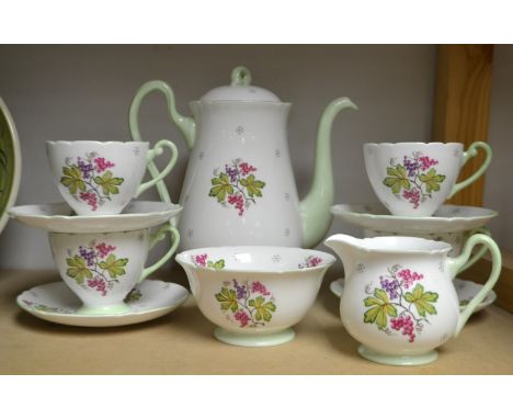 A Shelley Grape Wine part coffee service, no. 2349, comprising coffee pot, sugar, four cups and saucers