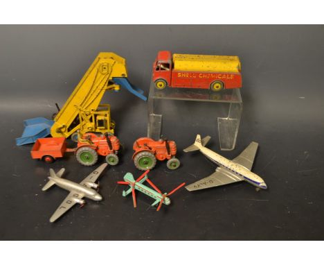 Dinky Toys - A.E.C Monarch Shell Thompson petrol Tanker, grey wheels, yellow hubs;  two Field Marshall 301 Tractors one with 