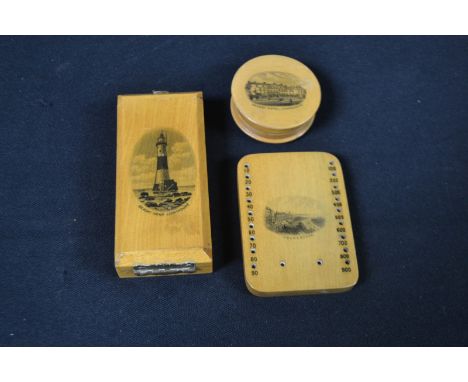 A Mauchline ware cased hourglass, the rectangular front cover printed with Beachy Head Lighthouse, hook clasp, suspension loo