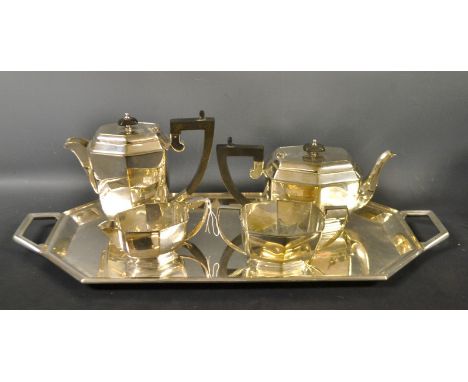 A silver plated four-piece tea service, of shaped rectangular form, comprising tray, teapot, hot water jug, milk and sugar 