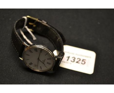 A Tissot quartz dress watch, white dial, Roman  numerals, black leather strap  