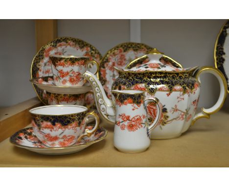 A Royal Crown Derby 2649 pattern tea service comprising teapot, two tea plates, four saucers, three cups, milk jug  