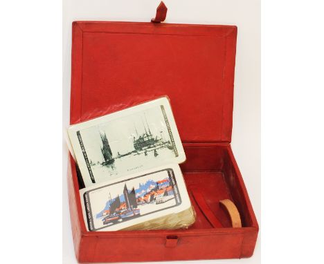 LNER Playing Cards housed in a leather covered box. There are two, unopened packs inside, one having sepia backs showing full