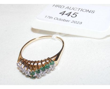 An emerald and diamond multi stone ring - marked 14kCONDITION REPORTsize approx S/R