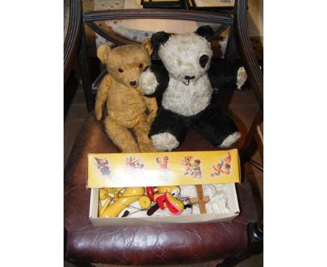 A vintage Pelham Puppet of Disney's Pluto, together with two straw filled bears 