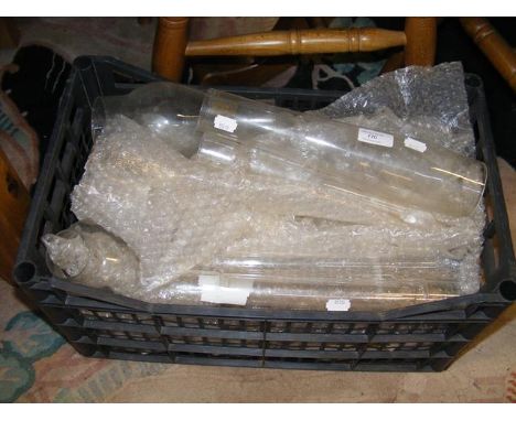 A quantity of glass oil lamp chimneys 