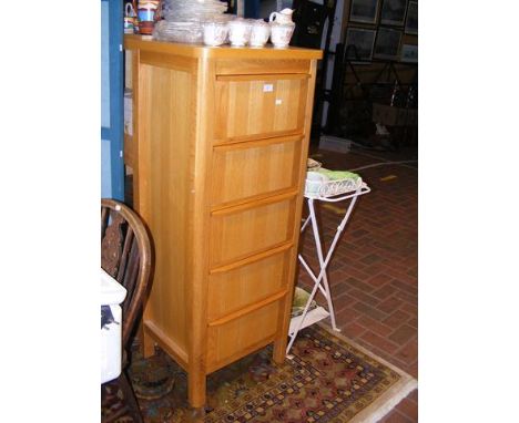 A light oak tallboy - width 55cm 