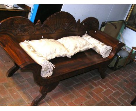 A modern scroll arm hall bench