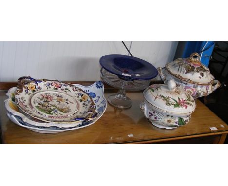 An antique ceramic tureen and cover, blue and white meat plates etc.