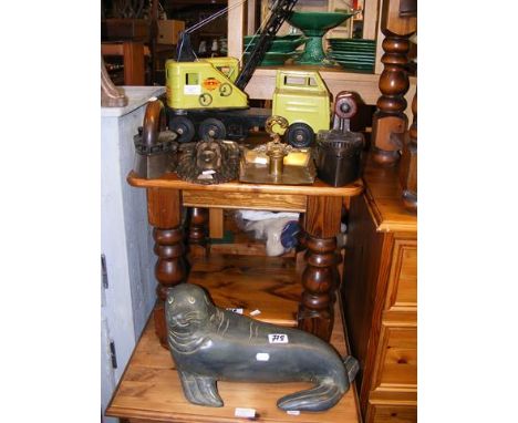 A vintage Louis Marx & Co. tinplate crane vehicle, together with carved wooden seal and assorted metal ware 