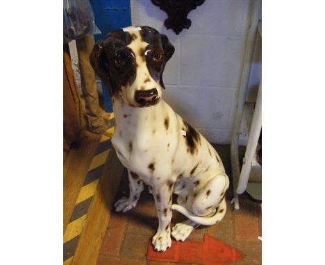 A life size ceramic dog  CONDITION REPORT  We have attached a number of additional images to showcase the lot in further deta