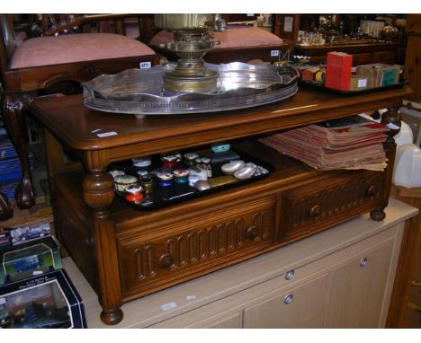 An Ercol two tier coffee table with two drawers below - length 110cm 