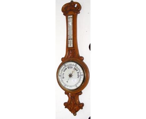 A late Victorian oak barometer/thermometer - 85cms