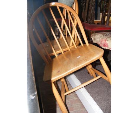 A pair of Ercol spindle back chairs 