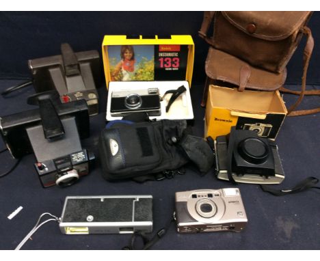 A collection of mid 20th Century and later box cameras, Polaroid and others.