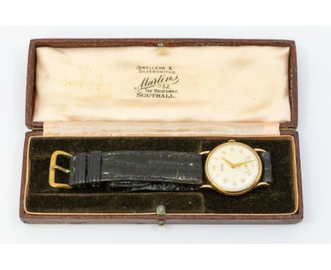 Rotary- a gents 9ct gold cased vintage wristwatch, comprising a round cream signed dial with applied gilt Arabic markers, sub