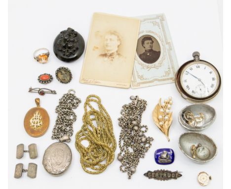 A collection of various late Victorian and later jewellery to include a carved jet mourning locket with grape vine decoration