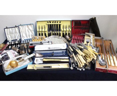 A large collection of loose and cased flat-wares, mostly plated, some steel, also a tea strainer and stand, boxed Tutbury cry