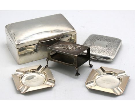 A George V silver cigarette box, of rectangular shape with domed cover and cedarwood interior, hallmarked by William Neale, B