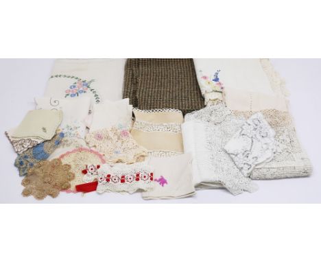 A collection of whitewear to include linen, napkins, tablecloth and a floral 50s tablecloth, 1930s tray cloths etc along with