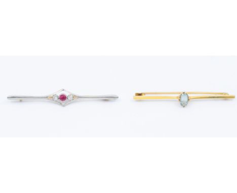 Two Edwardian 15ct gold stone set brooches, to include an aquamarine set bar brooch, length approx 60mm, total gross weight a