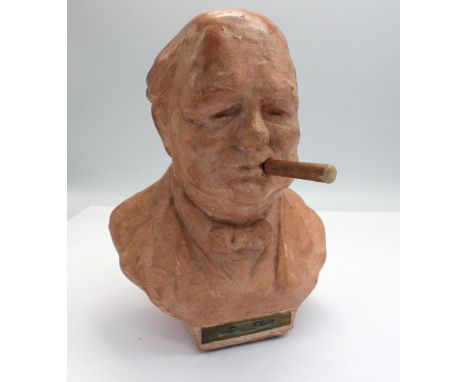 A mid 20th century Tallent of England terracotta bust striker/table lighter in the form of Winston Churchill, the cigar detat